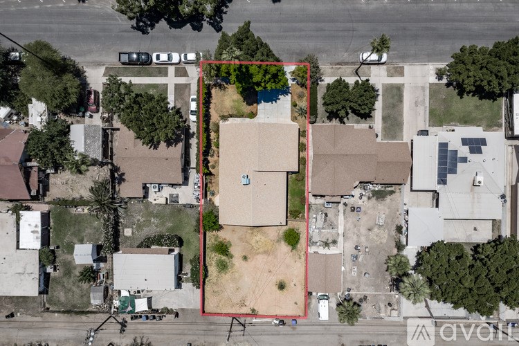 A red square is drawn on a map of a neighborhood.