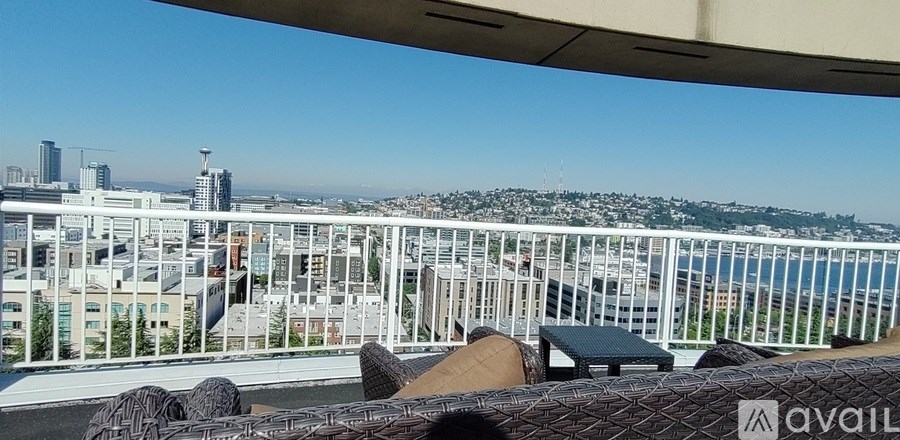 A balcony with a view of the cityscape.