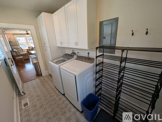 A laundry room with a washer and dryer.