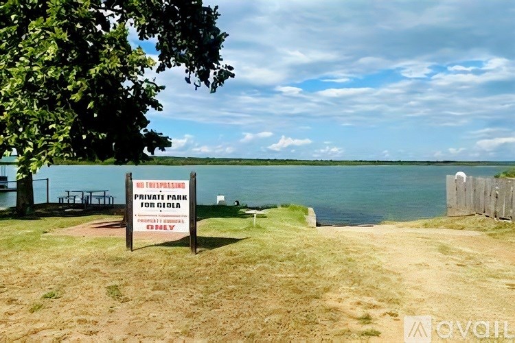 A sign in front of a body of water reads "PRIVATE PARK FOR VIDEO".