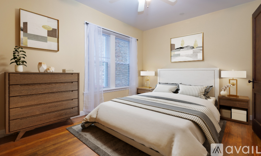 A bedroom with a large bed, a dresser, and a window with curtains.