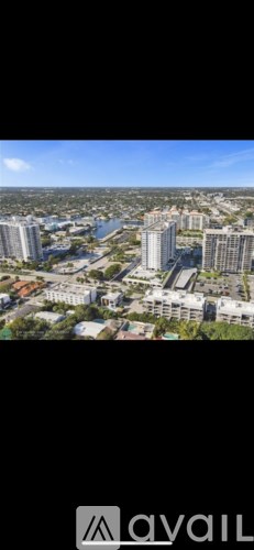 A cityscape with a river running through it.