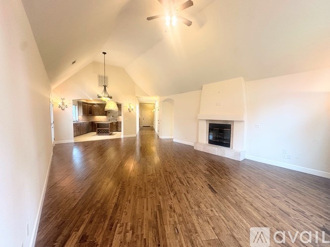 A white closet with shelves and a door.