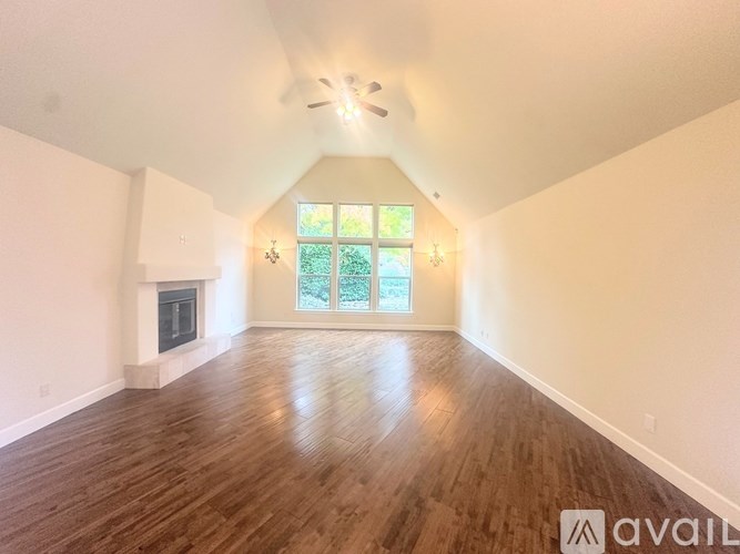 A white door is in a room with a carpet floor.