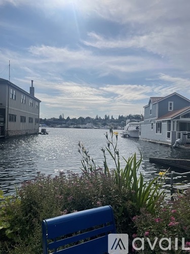 A sunny day at the marina with boats docked and a clear blue sky.