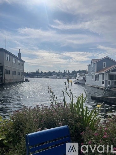 A sunny day at the marina with boats docked and a clear blue sky.