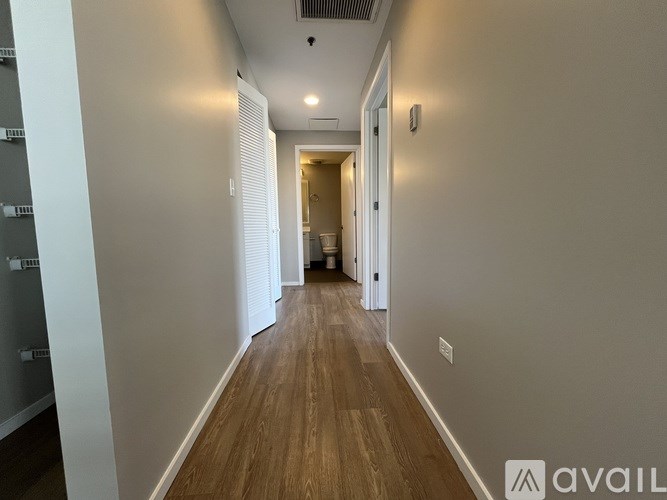 A living room with a view of the city.