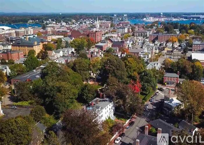 A cityscape with a mix of residential and commercial buildings.