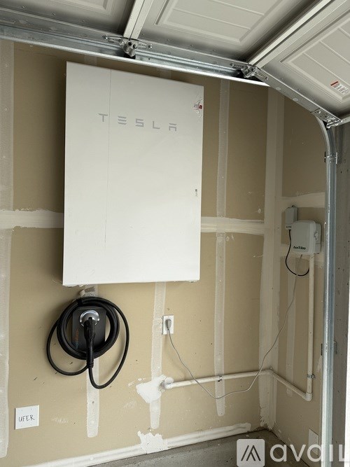 A Tesla power pack is installed in a wall.