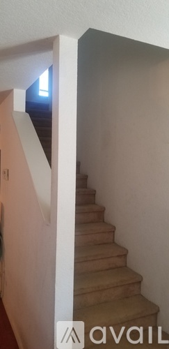 A staircase with a light on the top.
