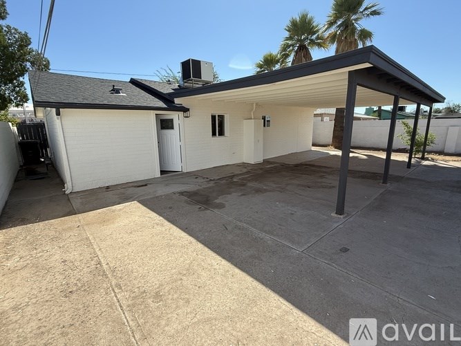 A house with a garage and a driveway is available for rent.