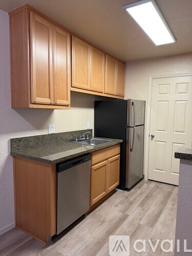 A room with a sliding glass door leading to a deck.