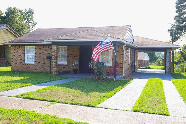 A house with a flag on the front.