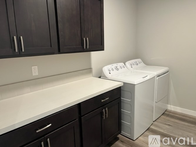 A laundry room with a washer and dryer.