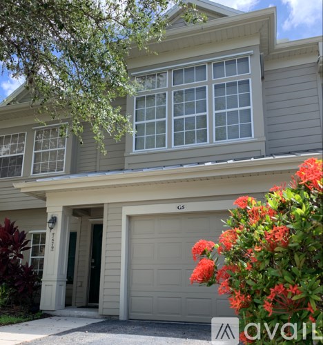 A house with a garage and a driveway.