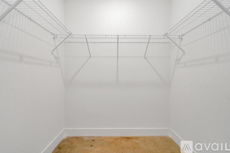 Empty white shelving unit in a room.