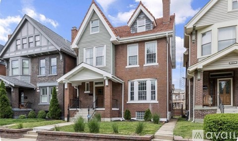Three houses with different designs and colors are shown.