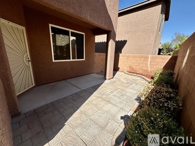 A house with a patio and a door.