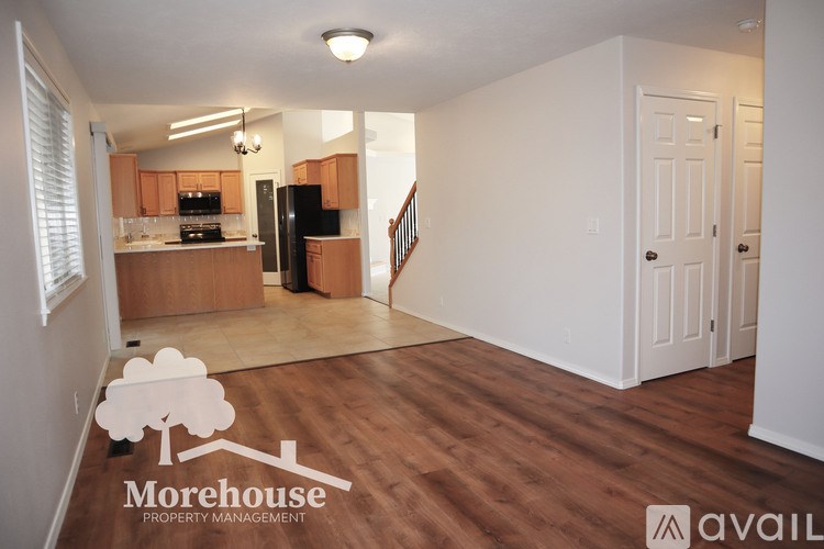 A Morehouse Property Management logo is displayed on a living room floor.