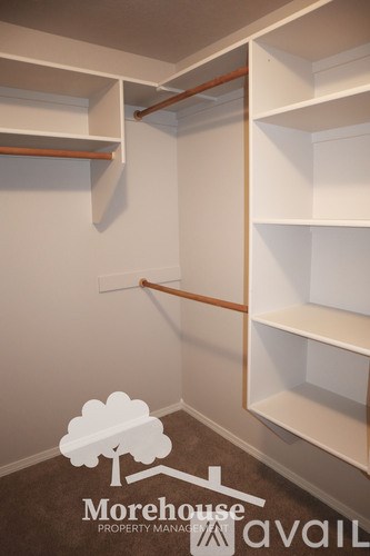 A Morehouse Property Management logo is overlaid on an image of a white closet.