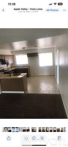 A kitchen with a counter and a window.