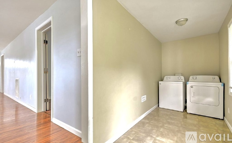A laundry room with a washer and dryer.