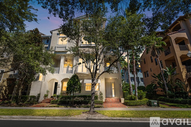 A house with a tree in front of it.