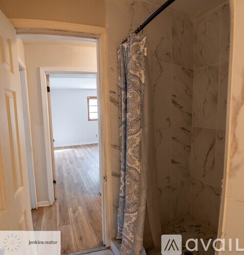 A room with a door and a window.