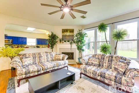 A living room with two couches and a coffee table.