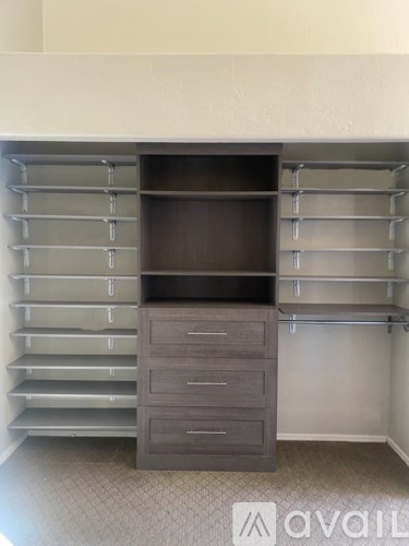 A large drawer unit with shelves and a cabinet.