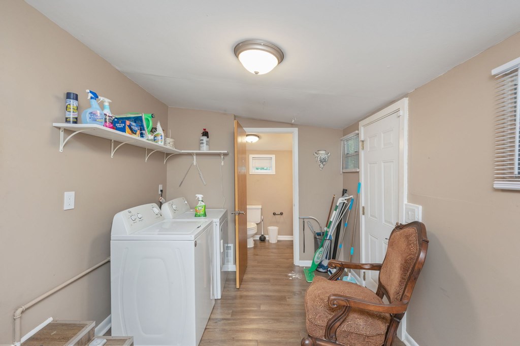A laundry room with a washer and dryer.