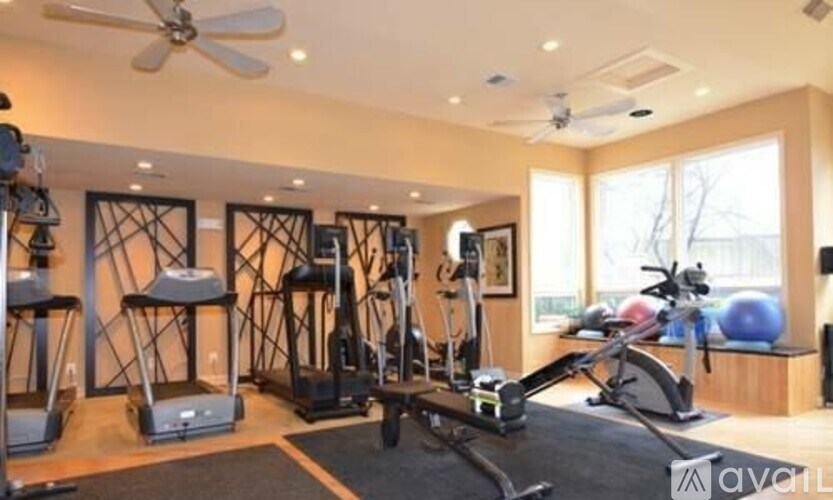 A home gym with a variety of exercise equipment.