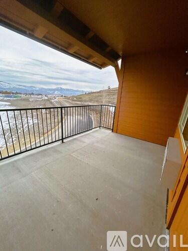 A balcony with a view of the mountains.