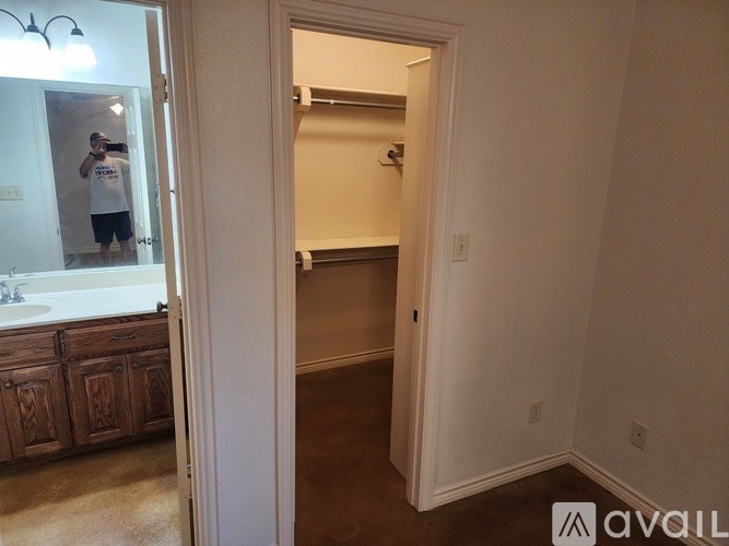 A person is taking a selfie in a bathroom.