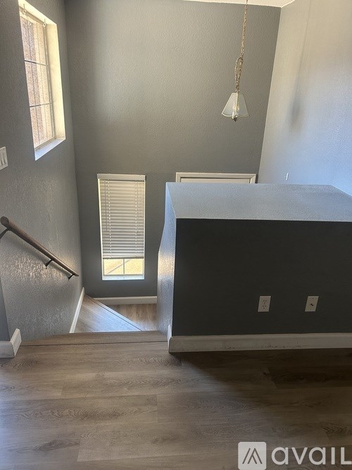 A room with a staircase leading to the second floor.