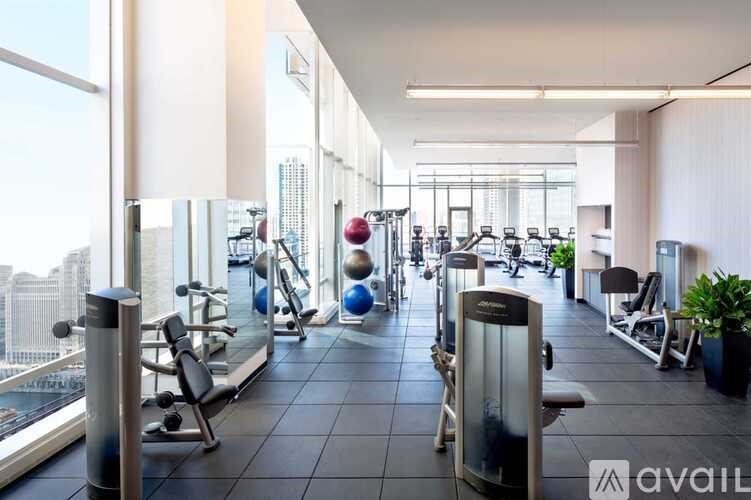A gym with a view of the city.