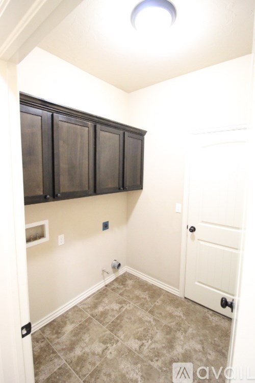 A white door is on the right side of the image.