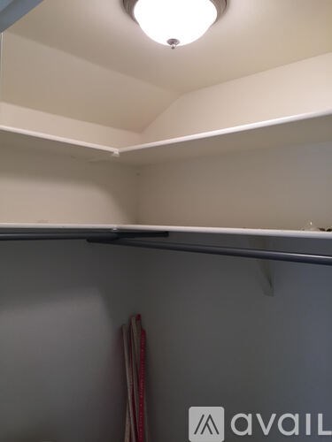 A wall with a Avail sign on it.