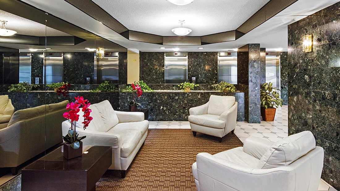 Apartment Lobby With White Couches