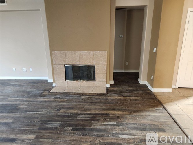 A white closet with shelves and a carpeted floor.