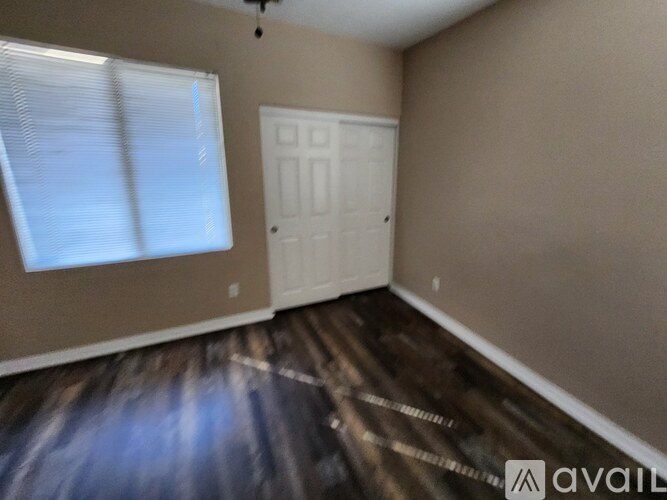 A white dishwasher and dryer are in a kitchen.