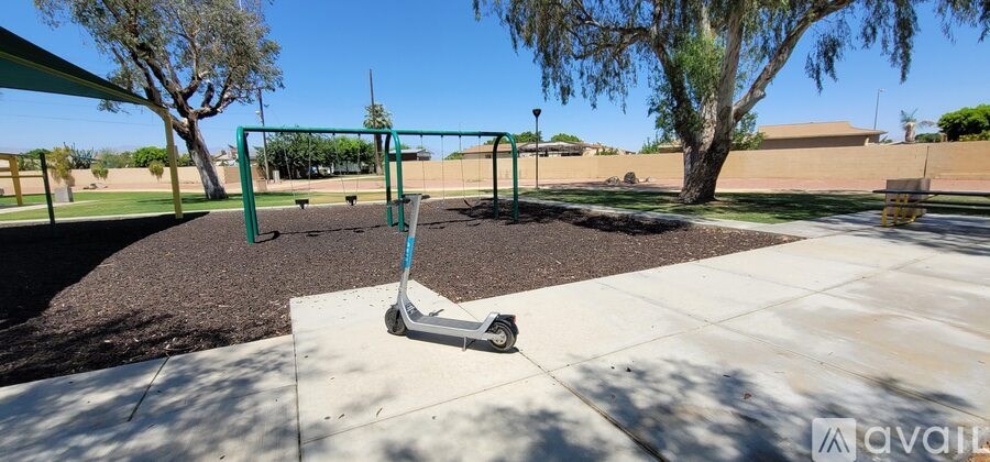 A playground with a seesaw and a slide.