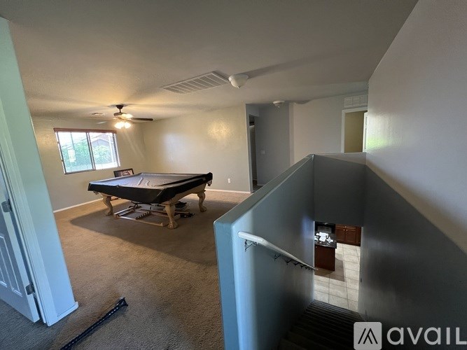 A room with a bed and a window.