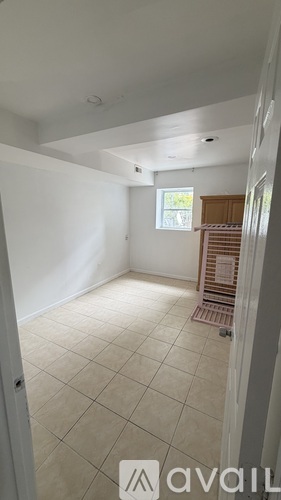 A kitchen with wooden cabinets and stainless steel appliances.