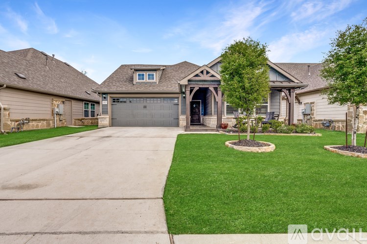 A house with a driveway and a garage.