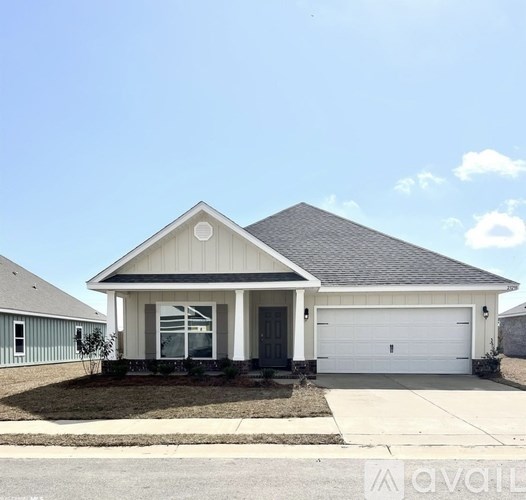 A two-car garage with a white door and a black roof.