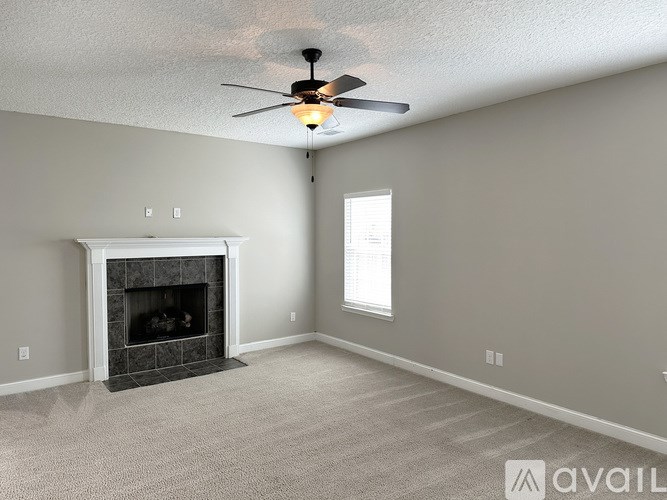 A kitchen with brown cabinets and a large island in the middle.