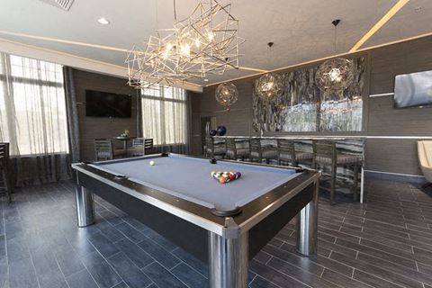a pool table in the middle of a room