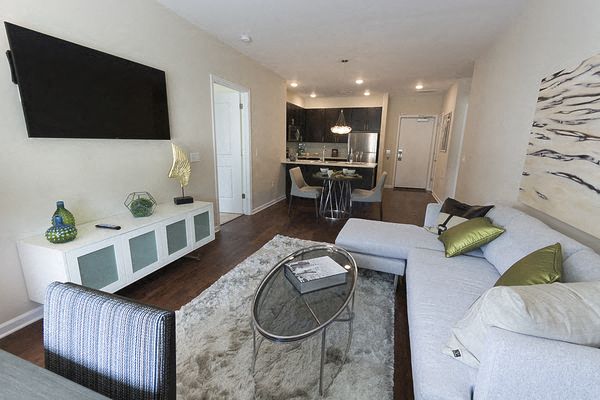 a living room with a couch and a table