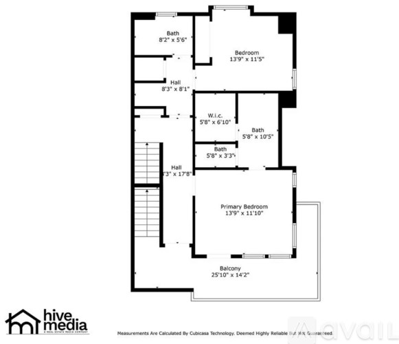 A floor plan of a house with a balcony and two bathrooms.